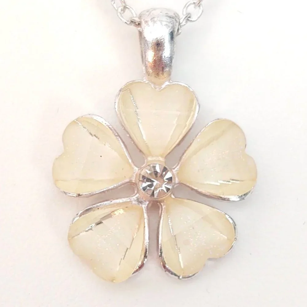 Cream flower pendant necklace with cz center and silver accents